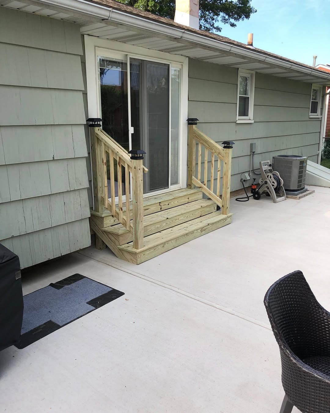 New exterior concrete steps and entrance